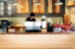 Selected Focus Empty Brown Wooden Table And Coffee Shop Or Resta Stock Photo