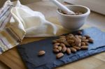 Almonds With Mortar & Pestle Stock Photo