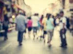 Blurred People Walking On The Street Of Old Town Stock Photo