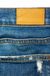 Closeup Blue Jeans With Leather Label Stock Photo