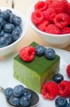 Green Tea Matcha Mousse Cake With Berries Stock Photo