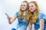 Two Girls Watching Tv Stock Photo