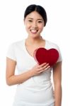 Smiling Pretty Girl With Love Heart Stock Photo