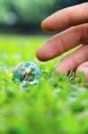 Hands And Earth Stock Photo