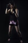 Asian Woman Boxer In Action Stock Photo