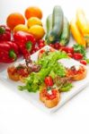 Original Italian Fresh Bruschetta Served With Fresh Salad And Ve Stock Photo