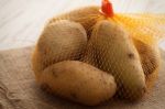 Potato Still Life On Wood Background Stock Photo