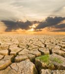 Drought Land Under The Evening Sunset Stock Photo