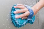 Hand Washing Brown Car With Blue Sponge And Bubbles (foam) Stock Photo