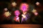 Firework Celebration From The Sea Shore Stock Photo