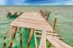 Wooden Pier Dock  And Ocean View At Caye Caulker Belize Caribbea Stock Photo