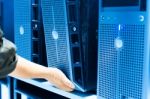 Man Fix Server Network In Data Center Room Stock Photo