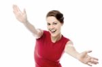 Ecstatic Woman With Open Arms Stock Photo