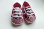 Pink Shoes For Baby Girl	 Stock Photo