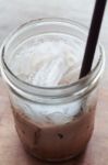 Iced Coffee On Wooden Table Stock Photo