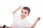 Portrait Of Happy Little Boy Over White Background Stock Photo