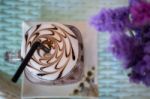 Top View Of Iced Chocolate On Glass Table Stock Photo