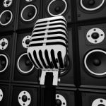 Microphone And Loud Speakers Shows Music Industry Concert Or Ent Stock Photo