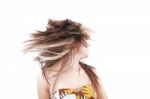 Woman Tossing Her Hair Stock Photo