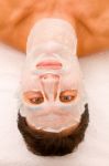 Close-up Of A Young Man With Face Mask Stock Photo