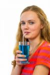 Girl Drinking Soda With Straw Stock Photo