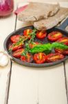 Baked Cherry Tomatoes With Basil And Thyme Stock Photo