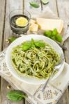 Homemade Spinach Pasta With Pesto And Parmesan Cheese Stock Photo