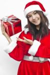 Santa Claus Hat With Red Christmas Gift Box Stock Photo