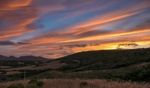 Sun Setting Beyond Palau In Sardinia Stock Photo