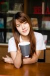 Portrait Of Thai Adult Student University Uniform Beautiful Drinking Coffee Stock Photo