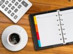 White Notebook And White Cup Of Hot Coffee Stock Photo