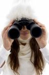 Beautiful Woman Looking Through Binocular Stock Photo