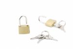 Two Golden Open Padlock With Keys On White Stock Photo