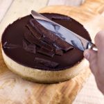 Fresh Classic Homemade Cheesecake With Dark Chocolate Topping Stock Photo