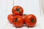 Red Tomatoes Fruits Isolated On White Stock Photo