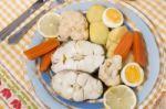 Hake Fish With Cauliflower And Potatoes Stock Photo