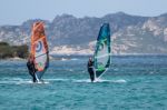 Windsurfing At Porto Pollo In Sardinia Stock Photo