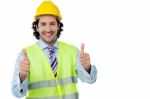 Successful Engineer Showing Thumbs Up Stock Photo