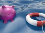 Piggy With Lifebuoy Shows Safety And Security Stock Photo