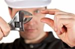 Handyman Wearing Uniform And Hardhat Stock Photo