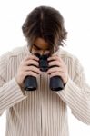 Male Looking Downward Through Binocular Stock Photo