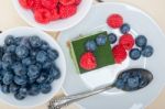 Green Tea Matcha Mousse Cake With Berries Stock Photo