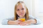 Beautiful Child Having Breakfast At Home Stock Photo