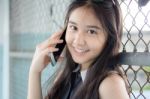 Portrait Of Thai Teen Beautiful Girl Calling Smart Phone Stock Photo