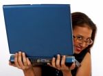 Girl Secretly Looking Behind Laptop Stock Photo