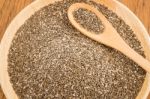 Nutritious Chia Seeds On A Wooden Plate Stock Photo