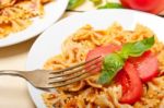 Italian Pasta Farfalle Butterfly Bow-tie And Tomato Sauce Stock Photo