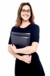 Smiling Women Holding Folder In Hand Stock Photo