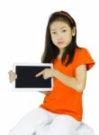 Asian Young Girl Is Holding Tablet Stock Photo