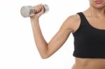 Body Of Slim Female In Activewear Doing Exercise With Dumbbells Stock Photo